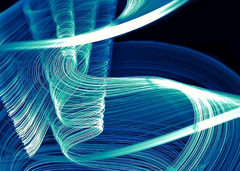 Abstract blue swirls on black background